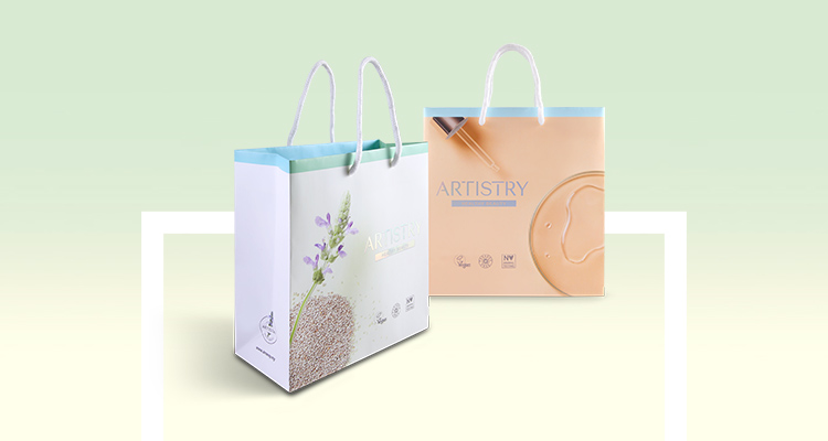 Front and rear views of the Healthy Beauty by ARTISTRY Paper Bag 